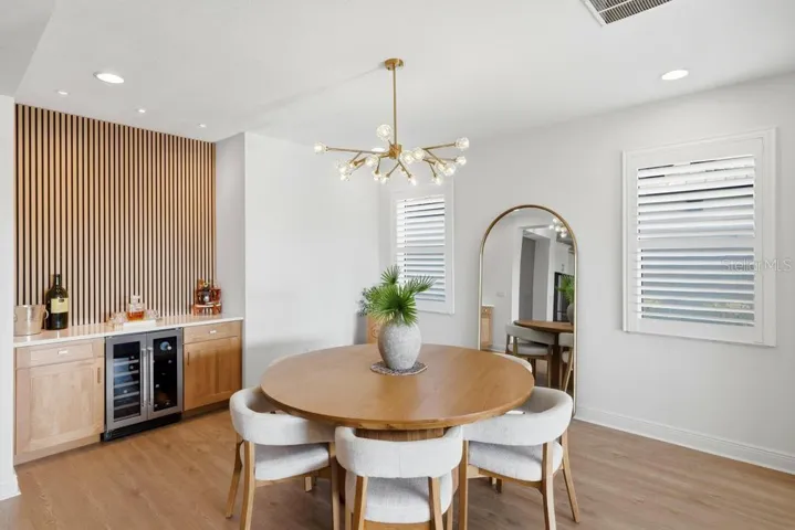 designer sparkling chandelier over the dining table