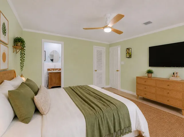 Primary bedroom with boho vibes - Virtually Staged