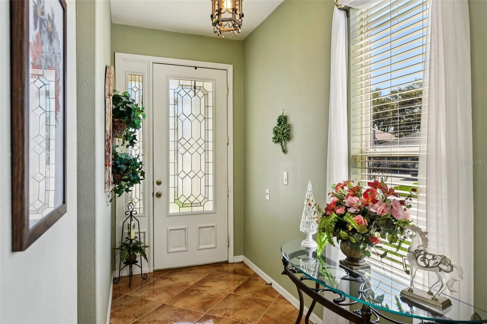 Such a Pleasant Entry. 9 ft ceilings and 8 ft doors...come Look.