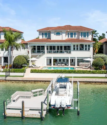 Spectacular deep-water view from your private pool, dual lanais, custom outdoor kitchen or boat dock with 13,000lb boat lift& 75' waterfront