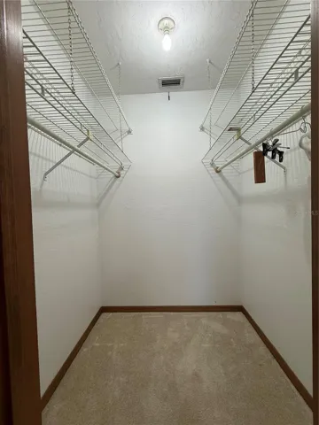 Primary Bedroom Walk In Closet