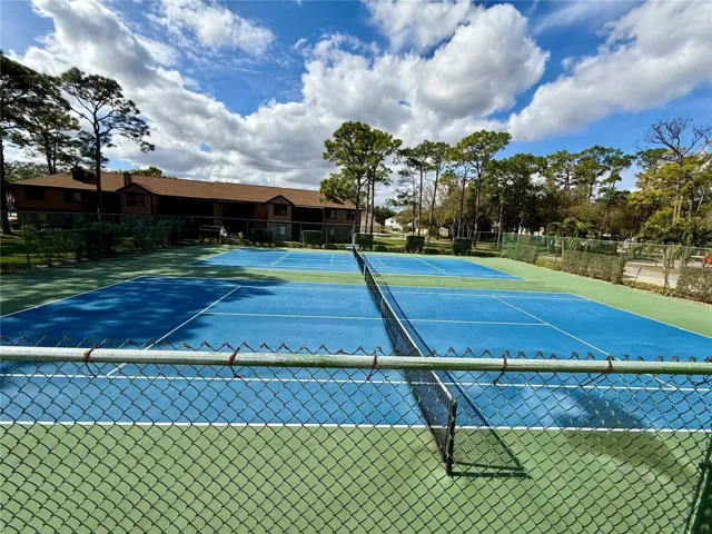 This community offers, Tennis, Raquet Ball and Basketball Courts, Shuffleboard, Fitness Center, Sauna, Hot Tub, Ping Pong Table, Car Wash Area, a Playground and a Multipurpose Clubhouse with a Kitchen and Library area