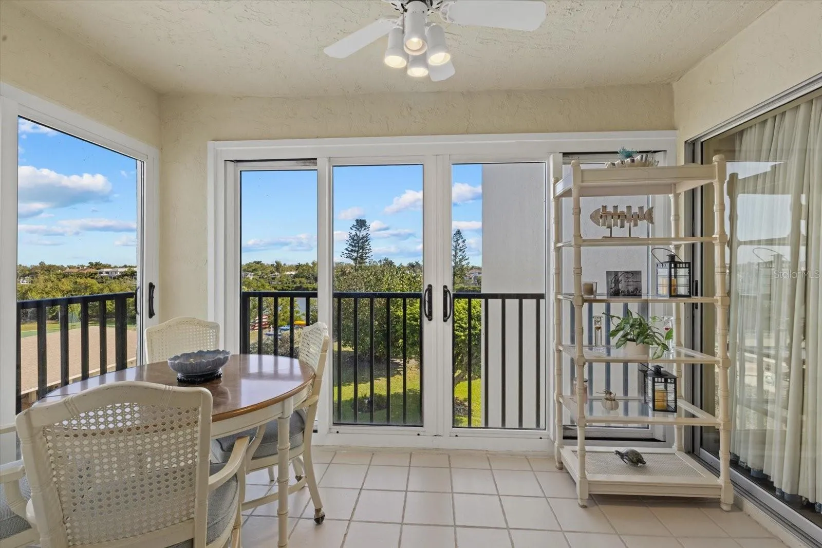 Glass enclosed Balcony with Bay Water views