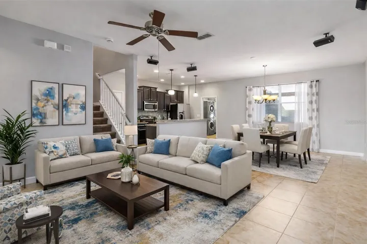 OPEN-CONCEPT LIVING AREA with HIGH CEILINGS and abundant NATURAL LIGHT perfect for everyday living and entertaining.