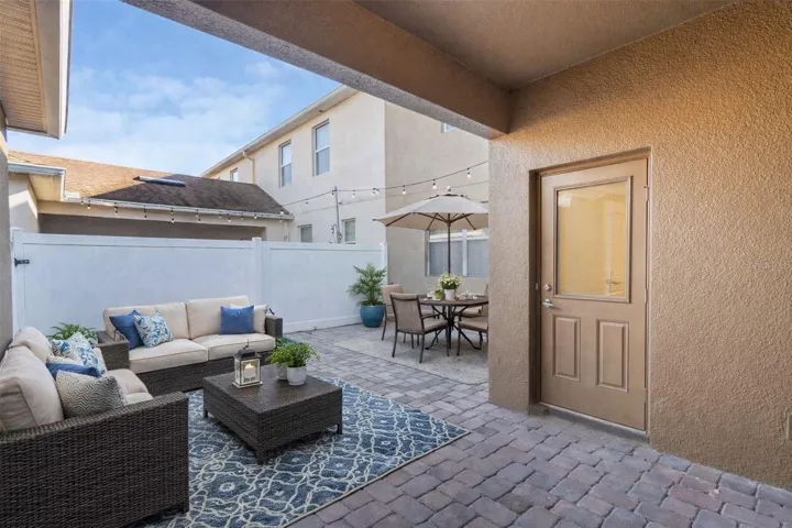 PRIVATE PAVERED COURTYARD LANAI perfect for OUTDOOR LIVING and RELAXATION.