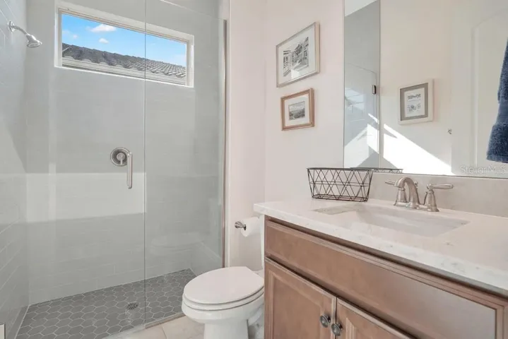 A full Bath on the main floor and A CONVENIENT MUDROOM AREA off the garage add everyday practicality with a touch of style.