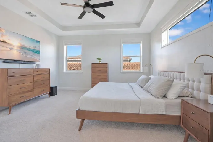 Upstairs, retreat to your LUXURIOUS Primary Suite, complete with tray ceilings and CHIC BARN DOORS that lead into a SPA-INSPIRED EN SUITE BATH and walk-in closet.