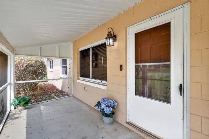 Screened front patio.