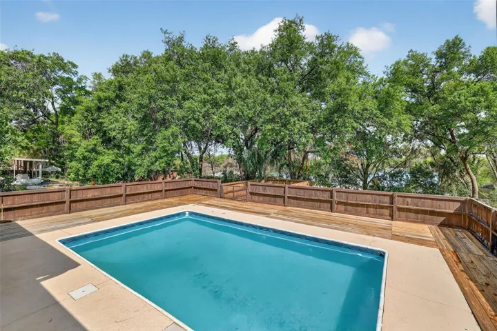 ***Note - portion of deck beyond gate is unstable.*** Much of the decking around the pool has already been replaced.