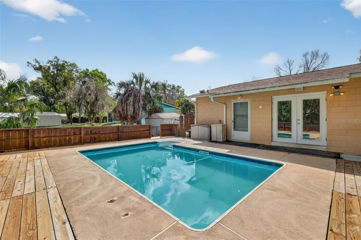 Huge deck area around 9' x 12' pool.