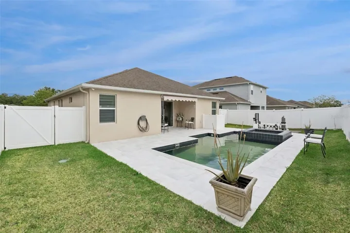 Expansive Lot with Low-Maintenance Pavers