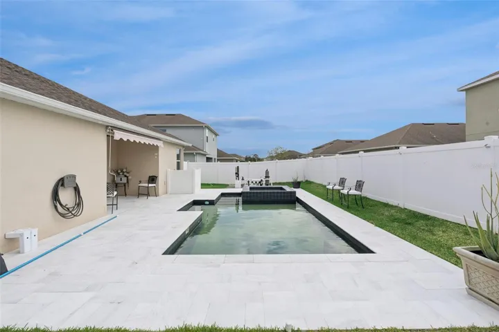 Elegant Stone Patio & Shaded Lanai