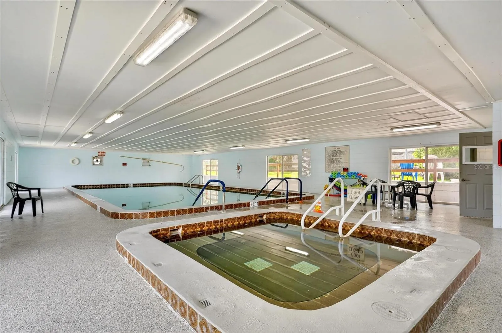 Indoor community pool and hot tub