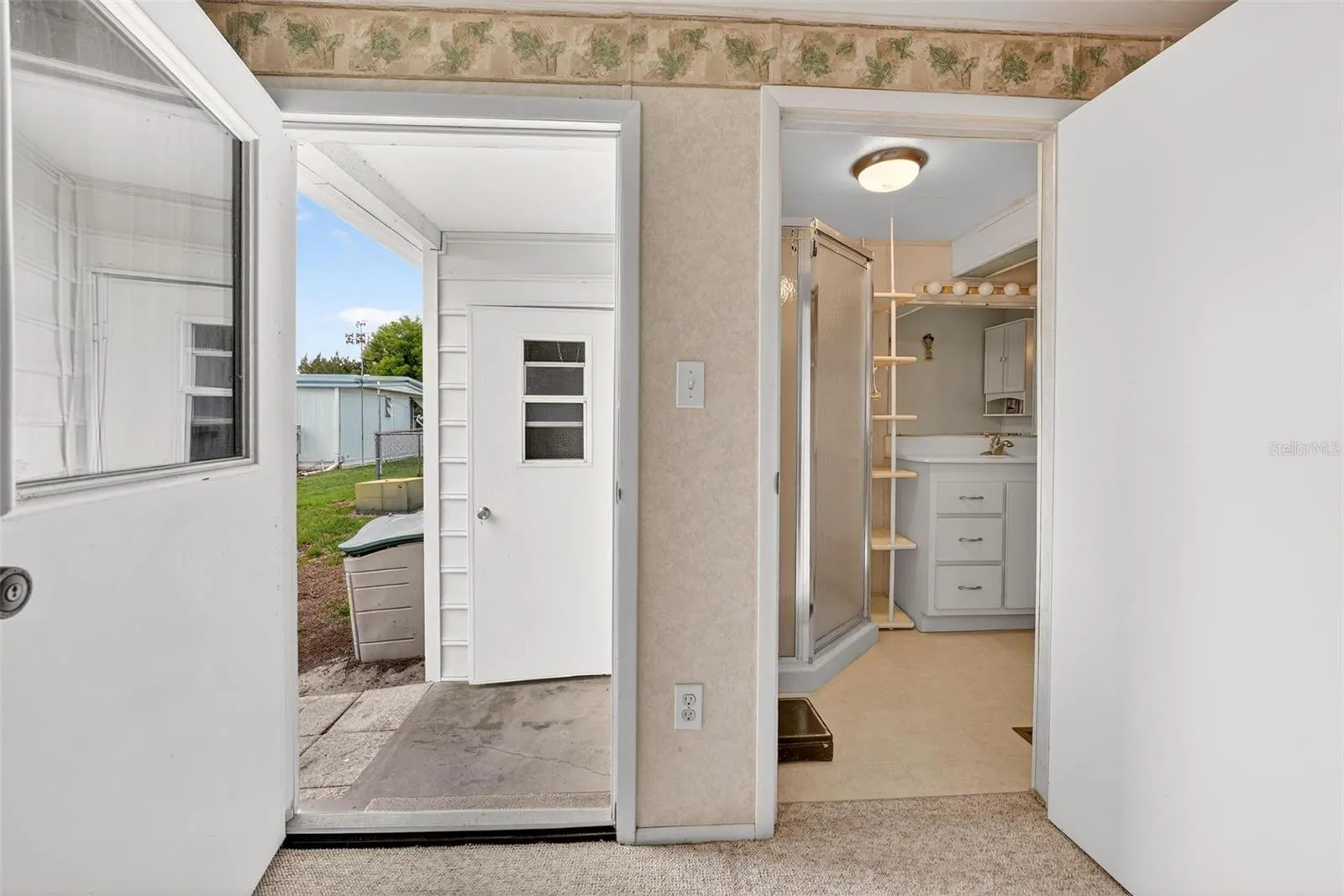 Living room access to attached outdoor shed