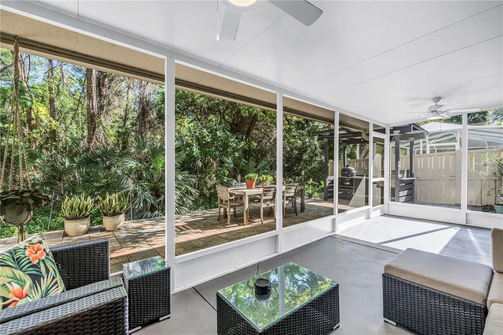 Outdoor Screened, Roofed and Outdoor Natural Shade elevated on the paver patio