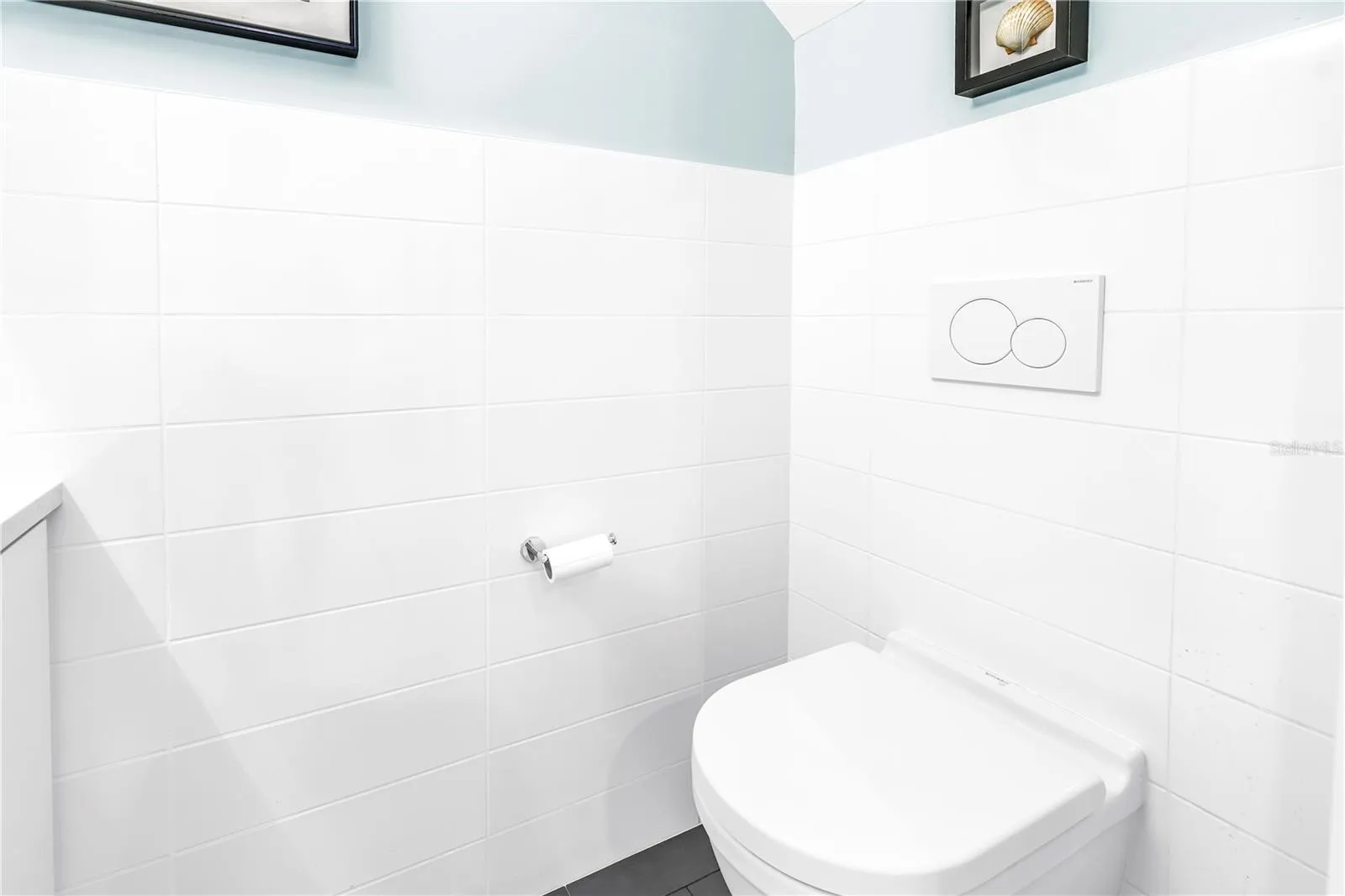First Floor Powder Room, wall mount toilet.  Super easy cleaning.