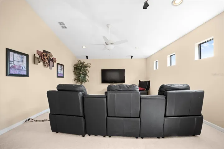 Theatre Room comes equipped with the Stadium seating  recliners, Theatre Decor, Sharp TV , and BOSE Surround Sound System.