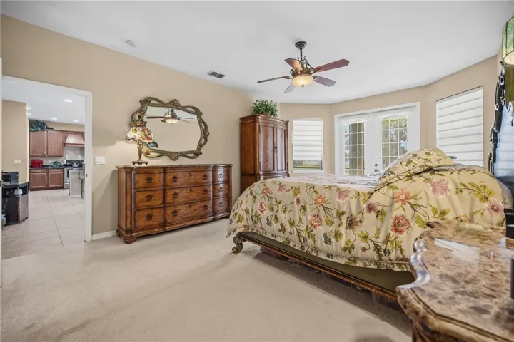 Primary Bedroom Is spacious & boasts French doors to the Lanai!