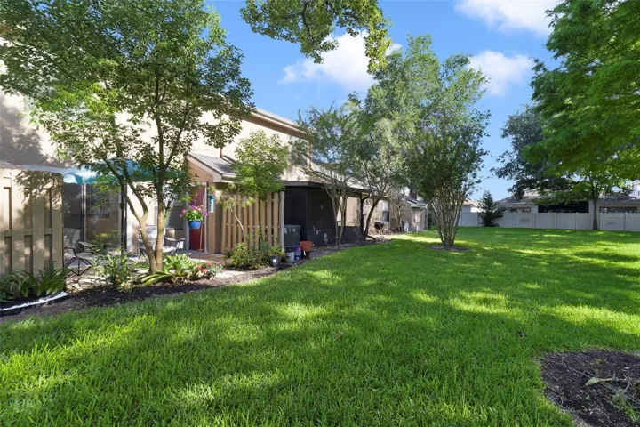 Enjoy peaceful views of the garden and GREEN SPACE—an inviting spot to enjoy your morning coffee or unwind at the end of the day.
