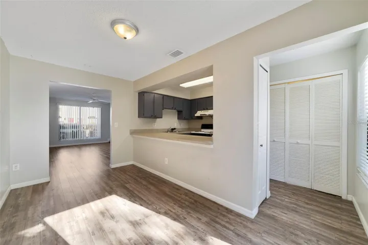 The OPEN LAYOUT flows seamlessly into the Dining area and Kitchen, creating an inviting setting for both everyday living and entertaining.