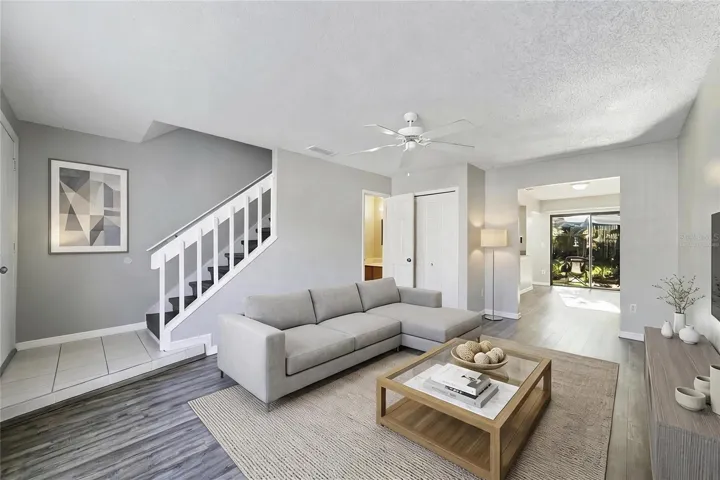 Step inside to find LUXURY VINYL PLANK FLOORING throughout and a bright, welcoming Living Room where a large picture window fills the space with NATURAL LIGHT and a stylish ceiling fan keeps the room comfortable all year long. Virtually Staged
