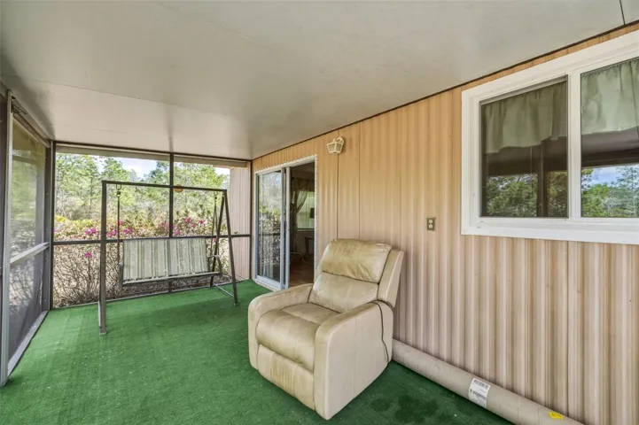Screened Porch seating Area