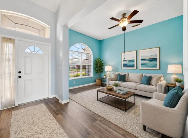 Virtually staged living room or easy to add doors to make it a den/office/workout room