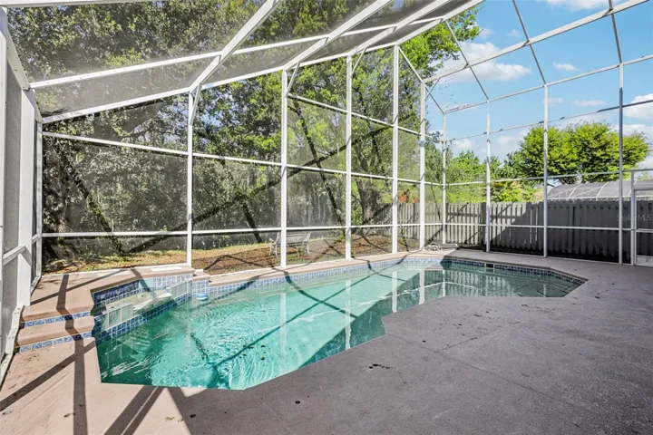 Private screened pool overlooks a conservation view!