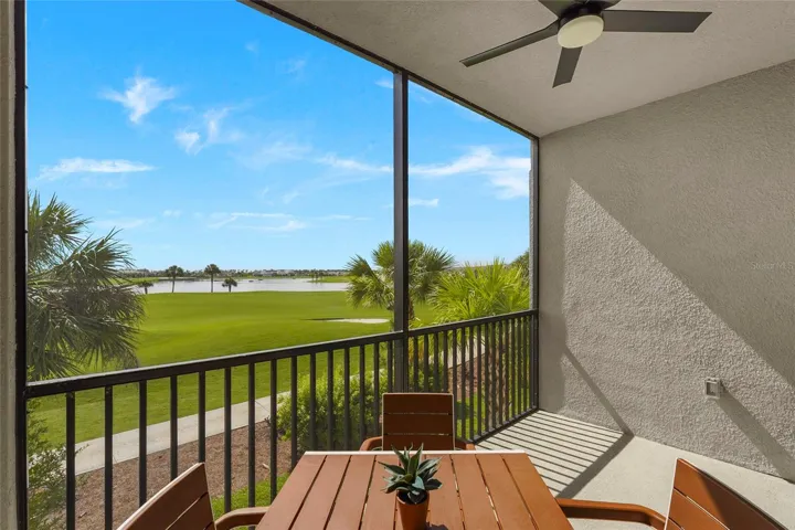 Screened lanai overlooking the golf course and lake