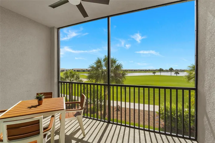 Screened lanai overlooking the golf course and lake