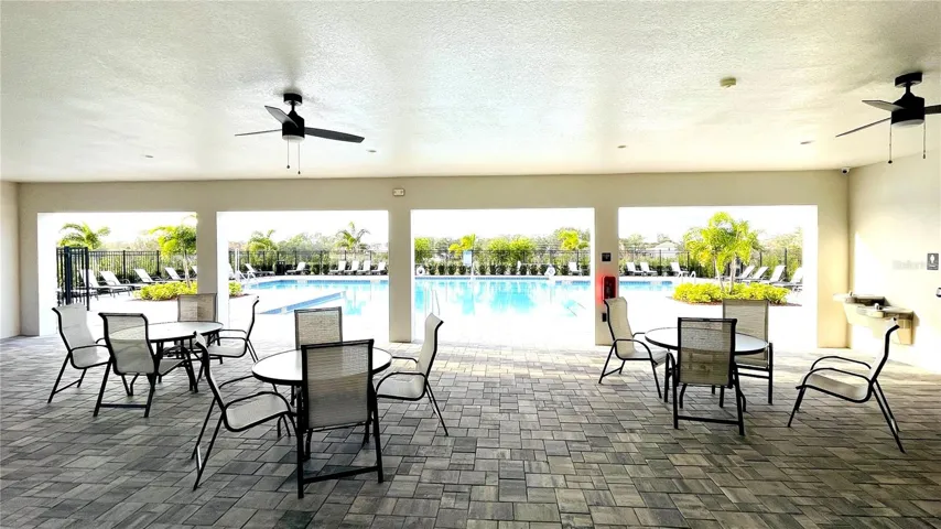 covered seating by pool