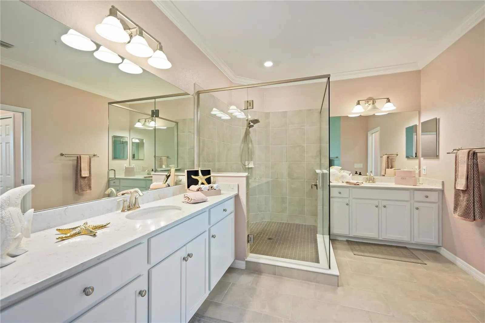 Ensuite bath - dual vanities, shower, private water closet, linen closet