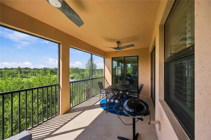Lanai has dining table, grill and lounge area