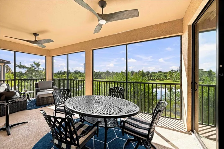 Lanai has dining table, grill and lounge area