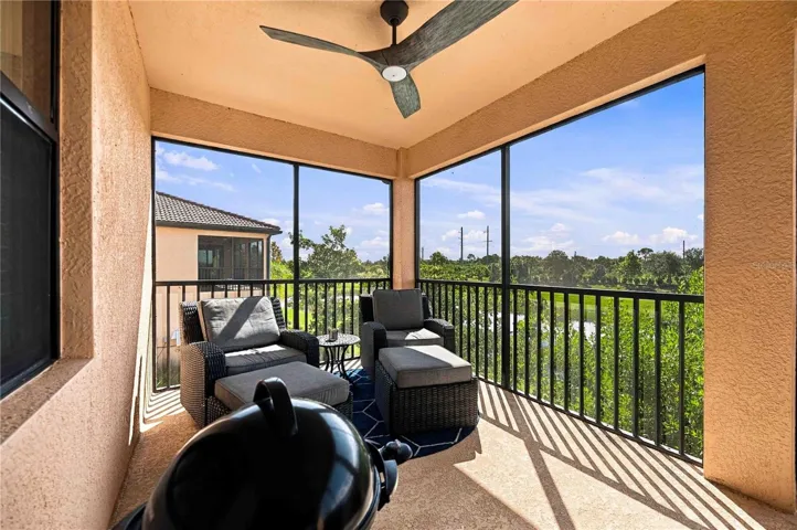 Lanai has dining table, grill and lounge area