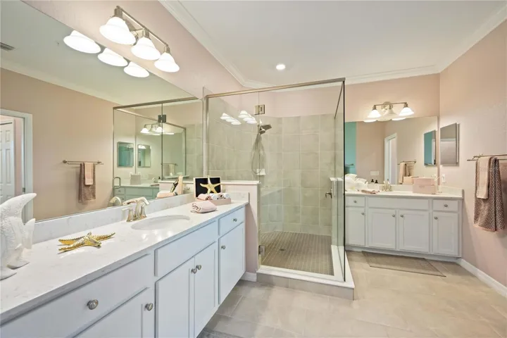 Ensuite bath - dual vanities, shower, private water closet, linen closet