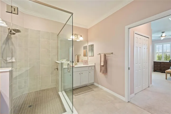 Ensuite bath - dual vanities, shower, private water closet, linen closet