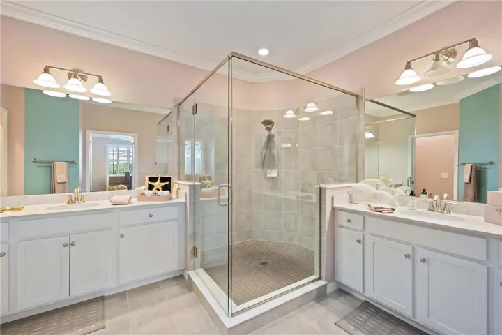 Ensuite bath - dual vanities, shower, private water closet, linen closet