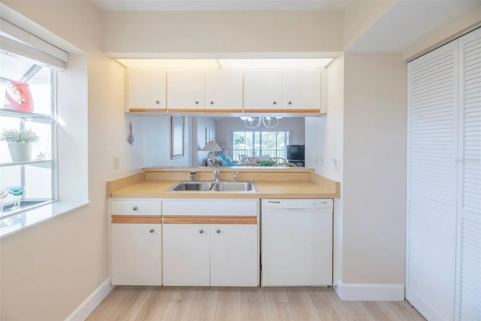 Naturally lit kitchen with a view.