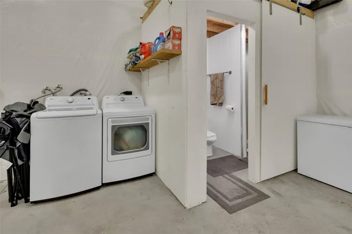 Laundry area inside outbuilding