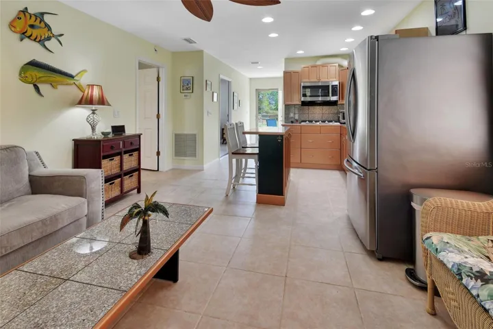 Home #2 shot of LR,Kitchen and dining area at Breakfast bar