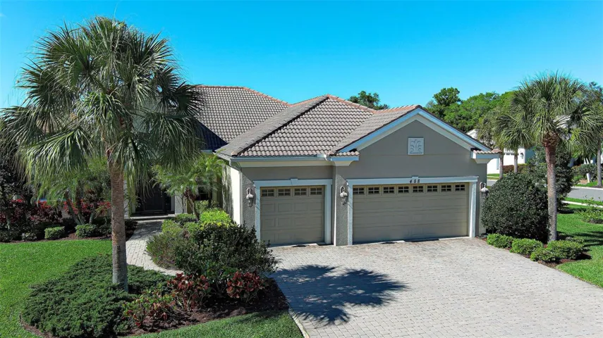 Stunning home has full hurricane shutter protection, to include impact window in the front, 4 impact French doors and hurricane rated garage doors.