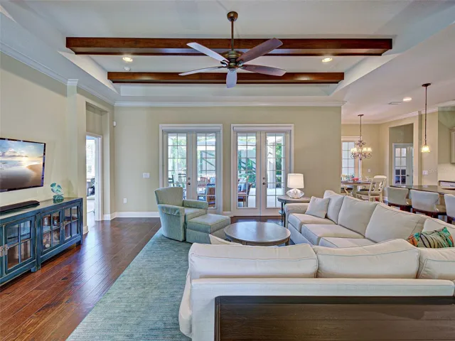 Wow!  Spacious and elegant, the great room flows seamlessly to the lanai and kitchen.