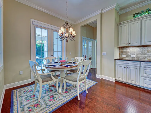 Sunny dinette area, just off of the kitchen is just right for a causal meal.
