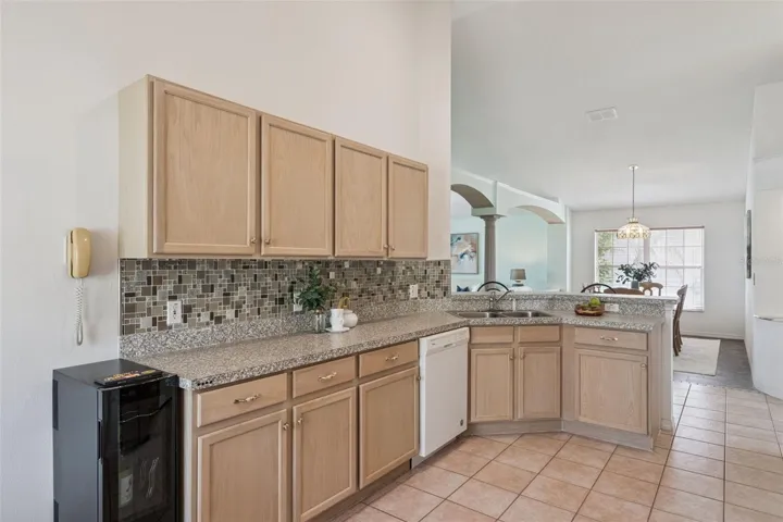 Open Concept Kitchen with bartop, Stainless Steel Appliances