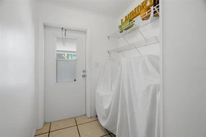 Utility room with washer and dryer hookup