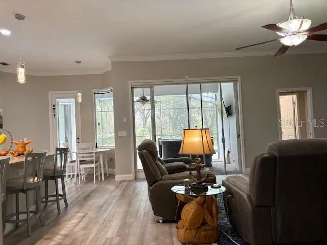 View from family room to private guest suite  Door leading to pool from private guest room hall way.