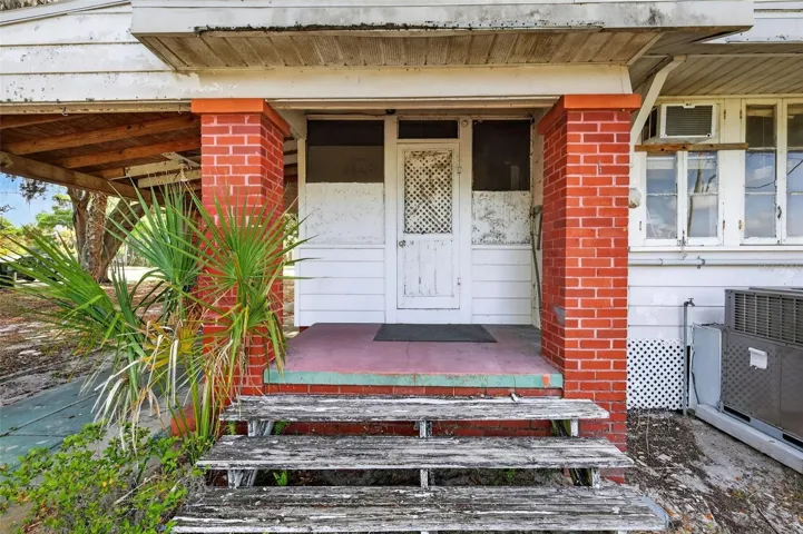 back porch leads to utility room