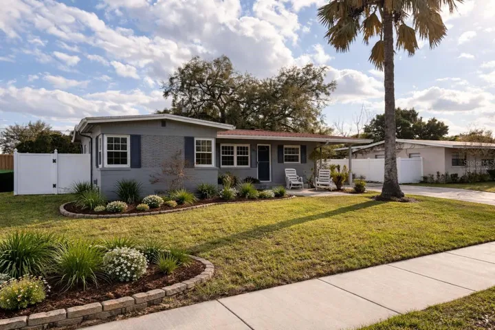 Virtually Staged front picture due to landscape  frozen plants