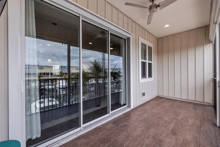 Upstairs screened balcony